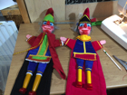 Two Mr Punch's having their costumes made